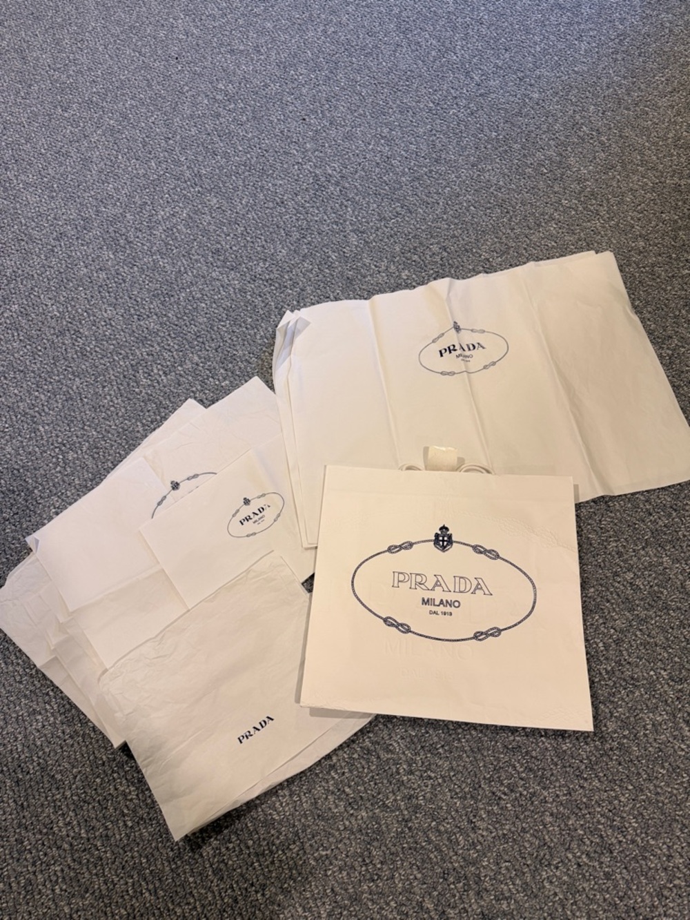 Prada White Shopping Bag with Navy Logo and 9 sheets of tissue paper